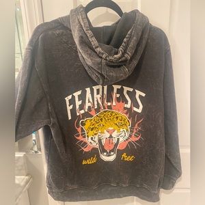 Grey, medium, distressed hoodie with pink and yellow print on the back